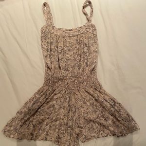Vestique romper 
Size small- never worn